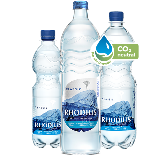 3 Flaschen mit RHODIUS Mineralwasser in unterschiedlichen Flaschen.