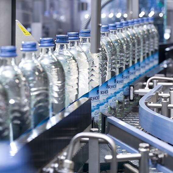Several bottles in a production line.