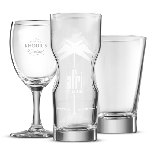 Three glasses in different designs stand next to each other.